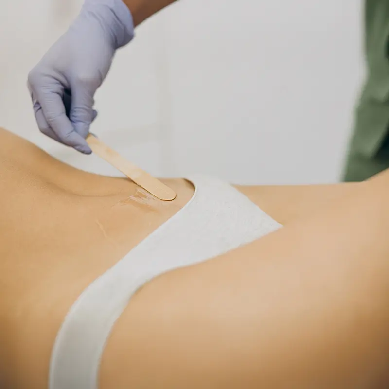 Tummy area hair waxing