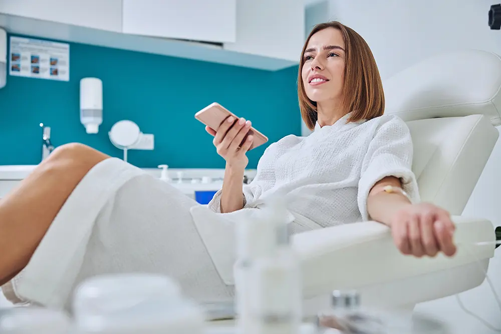 Woman getting an IV infusion