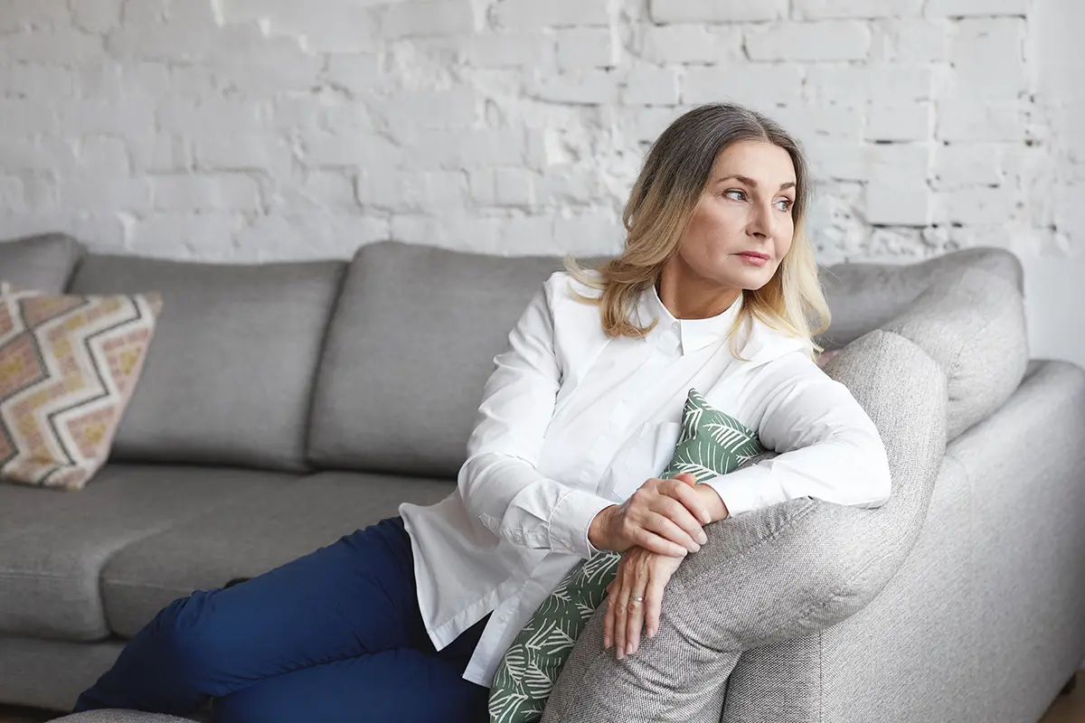 Expressive middle aged woman posing