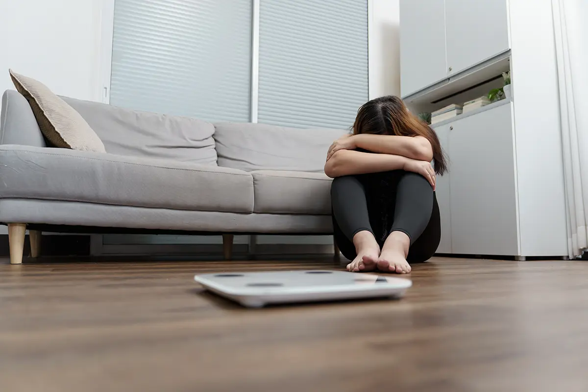 Sad woman with fat upset bored dieting weight loss fail fat diet scale sad asian woman weight scale home weight control